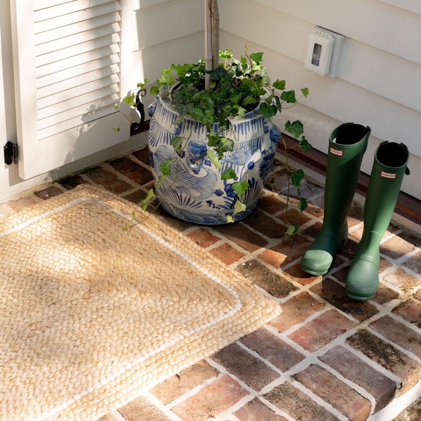 Braided Jute Doormat with Hand-spun Wool Accents - Ten Easy Street
