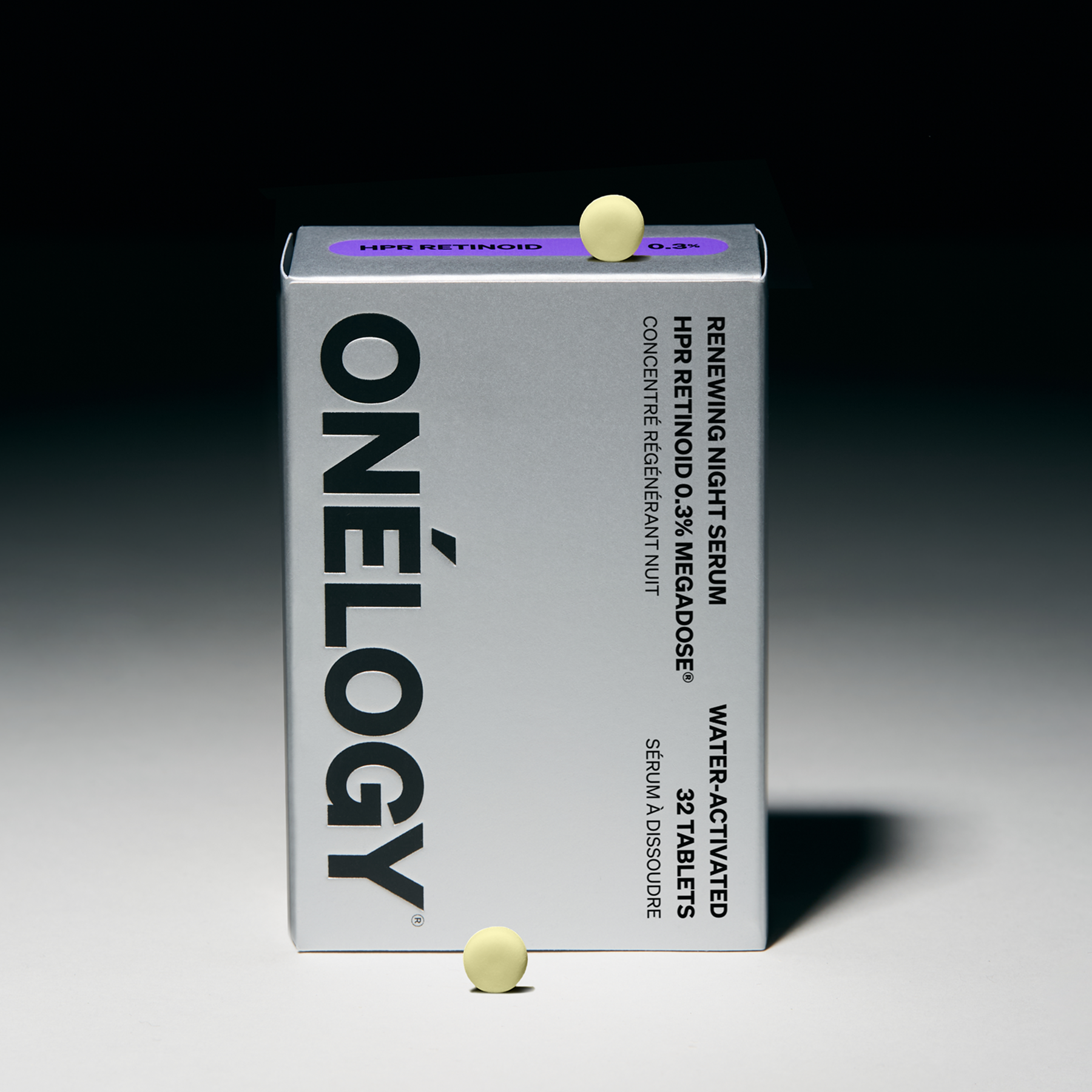 Onélogy serum packaging with tablets on a gradient background