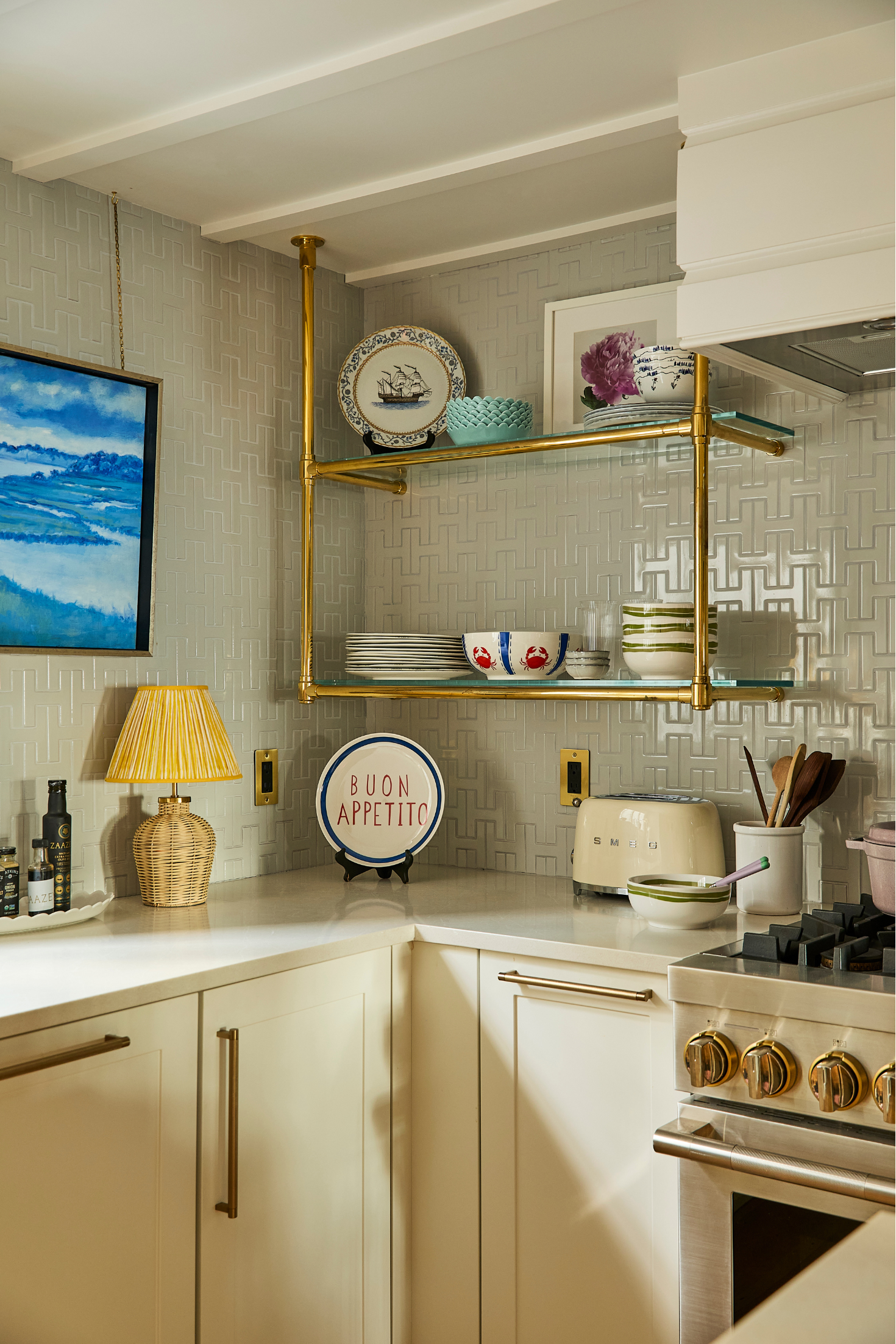 A kitchen corner with plates a wicker lamp and other kitchen accents