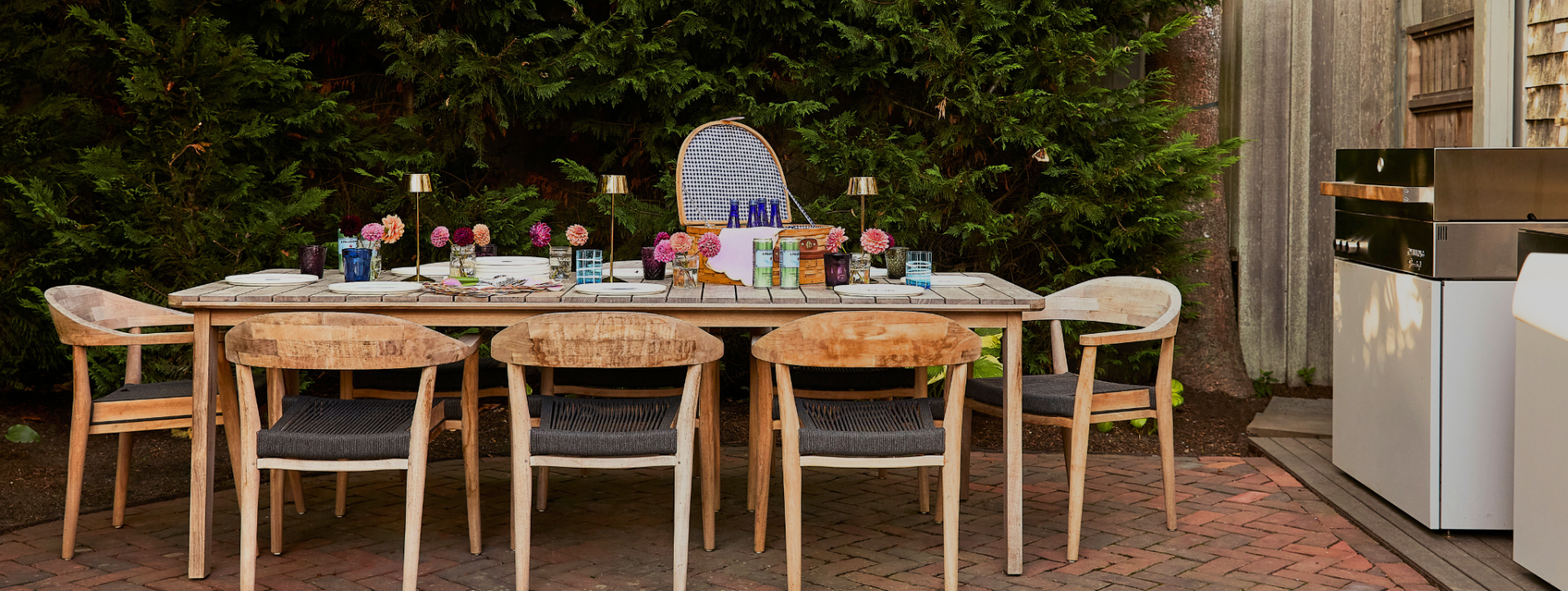 Outdoor dining setup with a table and chairs on a patio